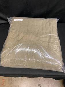 lot 23 image: Sealed Olive Green Quilted Comforter