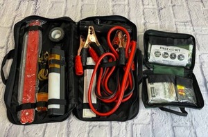 lot 33 image: AUTO Security Kit with Jumper Cables and First Aid Kit in Excellent Condition