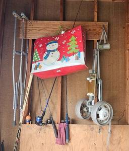 lot 40 image: Collection of Fishing Poles, Crutches, and Wheelchair Wheels