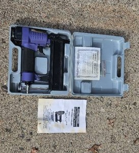 lot 60 image: Central Pneumatic Air Brad Nailer with Case