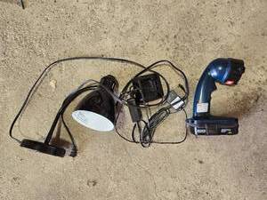 lot 91 image: Ryobi 18V Cordless Work Light with Charger and Lamp