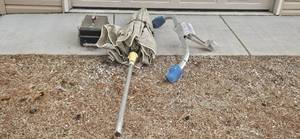 lot 101 image: Werner QuickClick Ladder Stabilizer, Patio Umbrella and Mini BBQ Grill Set