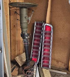 lot 103 image: Pair of Vintage Truck Tail Lights with Other Car Parts and Wood Pieces.