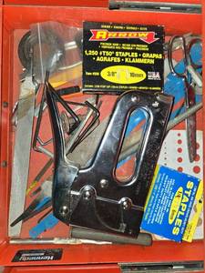 lot 127 image: Assorted Tool Set with Staple Gun, Drill Bits, and Hand Tools
