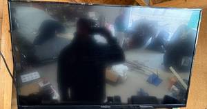 lot 161 image: Insignia 38-inch Flat Screen TV with Wall Mount and Remote Controls