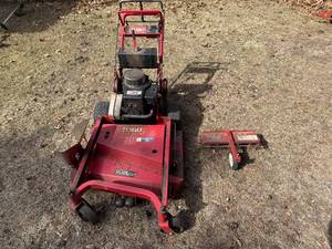 lot 168 image: Used Toro 36 Walk-Behind Commercial Lawn Mower with Snapper Thatcherizer