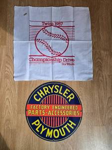 lot 194 image: Twins 1987 Championship Drive Towel and Chrysler Plymouth Sign