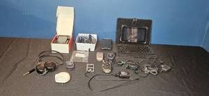 lot 213 image: Lot of Vintage Electronics with Tablet, Phones, Headphones, and Accessories