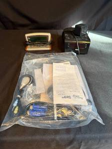 lot 266 image: Lot of 2 Alarm Clocks with Setup Guide and Cables