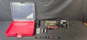 lot 402 image: Yaesu Portable Ham Radio Accessories with Low Pass Filter and Charger