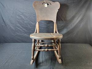 lot 404 image: Antique Wooden Rocking Chair with Unique Backrest Design