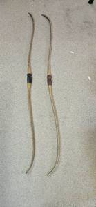 lot 484 image: Pair of Traditional Longbows with Leather Grips (No String)