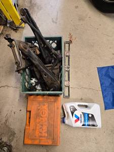 lot 501 image: Collection of Automotive Parts, Motor Oil, Spirit Level, and KNex Box Empty