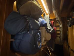 lot 518 image: Collection of Sleeping Bags and Outerwear Jackets