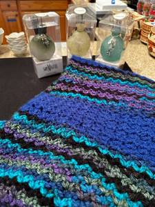 lot 197 image: Hand-Knit Multicolored Blanket and 3 San Miguel Fragrance Ornaments