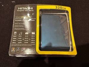 lot 201 image: Hitachi SimpleDrive Mini 320GB Portable External Hard Drive