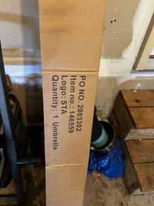 lot 230 image: New in Box Patio Umbrella and Heavy Duty Metal Garden Hose Reel with Hose
