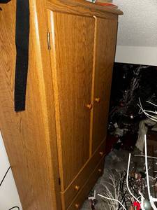 lot 377 image: Oak Wood Cabinet with Assorted VHS Movies and Cassette Tapes