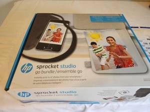lot 7 image: HP Sprocket Studio Go Bundle with Portable Photo Printer