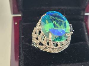 lot 13 image: Exquisite Large Oval-Cut Gemstone Ring with Intricate Silver Filigree Setting