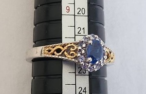lot 15 image: Sterling Silver and Gold Ring with Blue Stone, Size 8