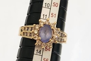 lot 16 image: 10k Gold Ring with Purple Stone and Likely Diamond Accents