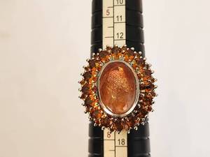 lot 20 image: Stunning Oval Sunstone and Garnet Silver Ring - Size 7