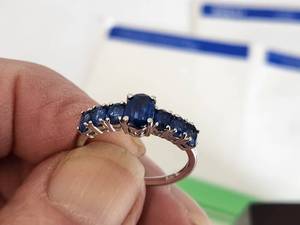 lot 21 image: Sterling Silver Ring with Sapphires - Size 9
