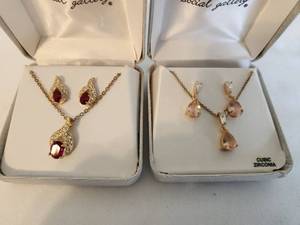 lot 84 image: Dazzling Jewelry Set with Cubic Zirconia and Gemstone Accents