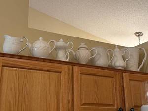lot 99 image: Collection of 7 White Porcelain Pitchers and Teapots