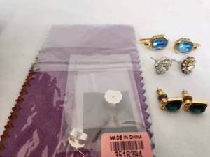 lot 143 image: Set of Elegant Stud Earrings with Cleaning Cloth