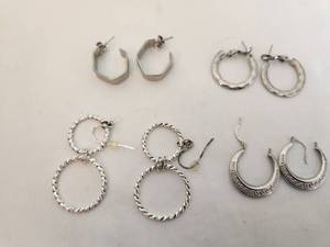 lot 169 image: Collection of 4 Pairs of Silver Tone Hoop Earrings