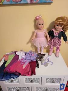 lot 284 image: Set of 2 Fashion Dolls with Assorted Outfits