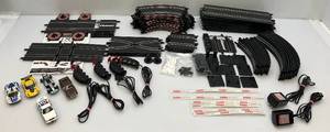 lot 5 image: Vintage Slot Car Track With Four Slot Cars (Seems Complete)