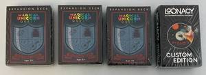 lot 7 image: Factory Sealed Mystical Gear Magical Unicorn Quest Expansion Decks & Loonacy Pyramid Arcade Custom Edition