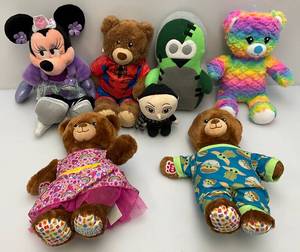 lot 14 image: Misc. Stuffed Animals Including Minnie Mouse & More