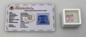 lot 36 image: Sndra Gemological labs (Lab Created) 7.0 CT. Radiant Shape Opal (Pink)With Card (In Protective Case)