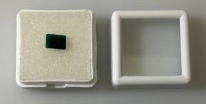 lot 46 image: 1.42CT  CT (Lab Created) Emerald Cut Green Dioptase  (In Protective Sleeve)