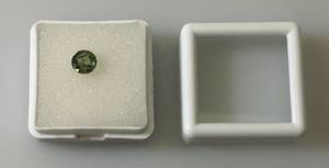 lot 54 image: .99 CT (Lab Created) Round Green Sapphire With (In Protective Case)