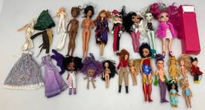 lot 76 image: Large Group Of Misc. Dolls & Clothes