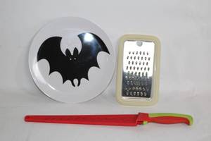 lot 26 image: Kitchen Utensil Set with Bat Design Plate, Grating Set, and Citrus Juicer