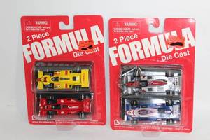 lot A-53 image: Set of 2 Formula Die Cast Car Packs - 4 Cars Total
