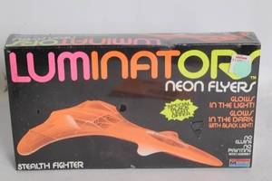 lot 143 image: Sealed Luminators Neon Flyers Stealth Fighter Model Kit