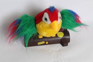 lot 253 image: Colorful Talking Parrot Toy on Wooden Base