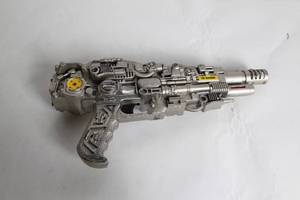 lot 270 image: Silver-Colored Toy Ray Gun with Steampunk Design