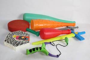 lot 319 image: Collection of Toy Bats, Swords, and Paddle Set