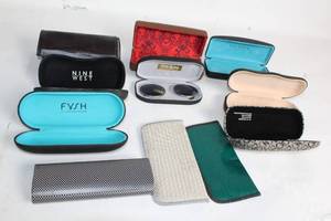 lot 334 image: Collection of 9 Eyeglass Cases Including Nine West, Anne Klein, and Ted Baker