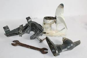 lot 342 image: Vintage Outboard Motor Parts Set with Rustic Wrench