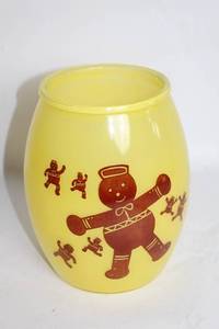 lot 380 image: Vintage Yellow Cookie Jar with Gingerbread Design