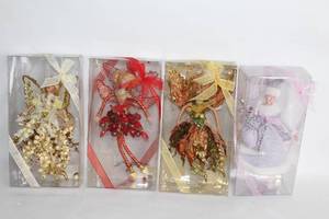 lot 419 image: Set of 4 Holiday Seasonal Fairy Figurines with Ribbon Decor